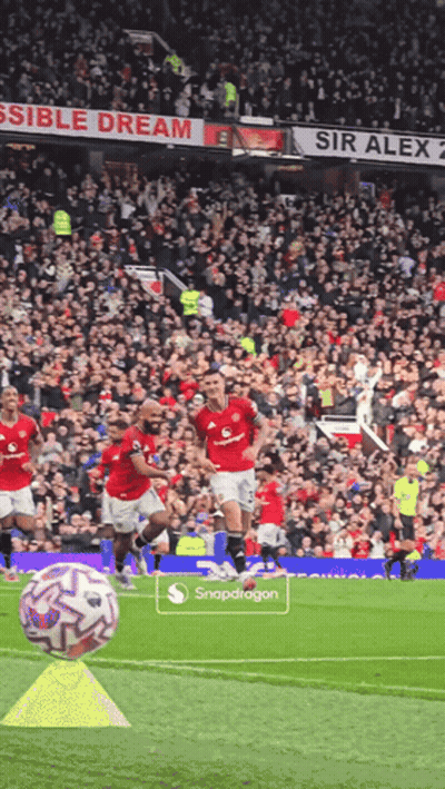 Soccer Game In Front Of Sir Alex Sign