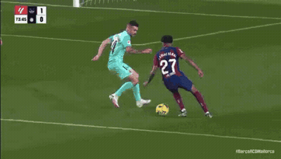 Soccer Game In Front Of Tonic Foot Wall GIF