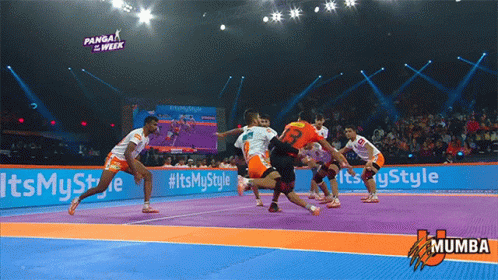 Soccer Game In Stadium With Advertisements For Mumba GIF