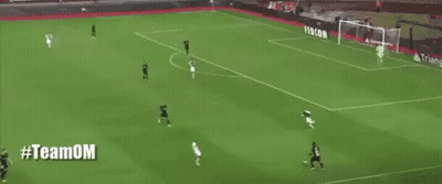 Soccer Game On Field With Obizza And Nike Ads GIF