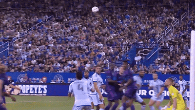 Soccer Game Underway With Popeye Sign GIF