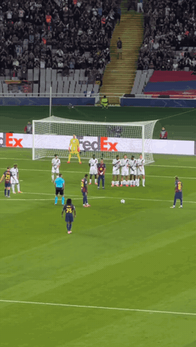 Soccer Game With FedEx Banner Behind Goal GIF