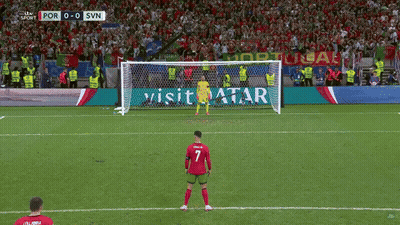 Soccer Game With Visit Qatar Ad Behind Goal GIF
