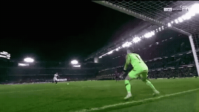 Soccer Goalie In Green Jersey Number 1 In Front Of Goal GIF