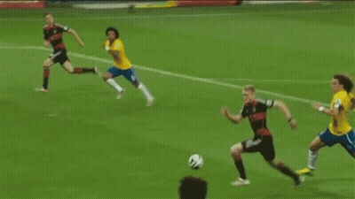 Soccer Goalie Jumping To Catch Ball With Yingli Solar Banner GIF