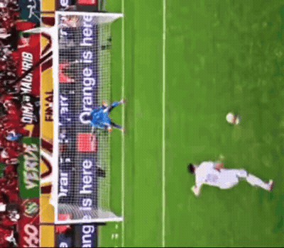 Soccer Goalie Jumps To Catch Ball In Front Of Orange Is Here Banner GIF