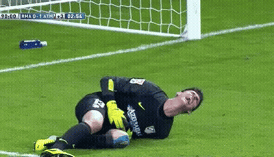 Soccer Goalie Laying On Field In Pain GIF
