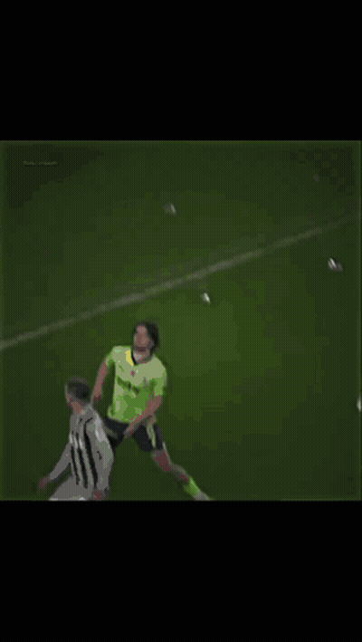 Soccer Goalie Leaping For Ball Under Real Banner GIF