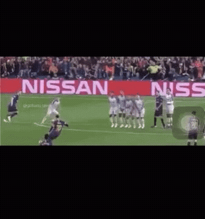 Soccer Goalkeeper In Front Of Nissan Banner GIF