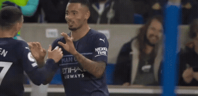 Soccer Player 47 Hugging Another Player