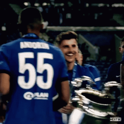 Soccer Player 55 Hugging Teammate With Trophy GIF