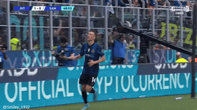 Soccer Player Celebrates Goal Before Cryptocurrency Banner GIF