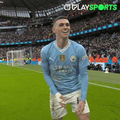 Soccer Player Celebrating Goal In Front Of Crowd GIF