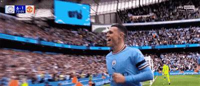 Soccer Player Celebrating Goal In Front Of Crowd GIF