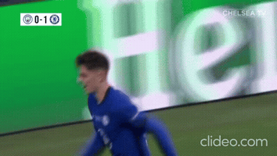 Soccer Player Celebrating Goal In Front Of Heineken Ad GIF