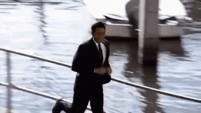 Soccer Player Celebrating Goal In Front Of VKUR Sign GIF