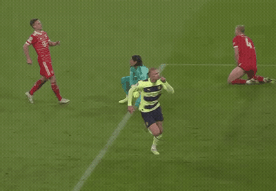 Soccer Player Celebrating Goal In Neon Yellow And Blue GIF
