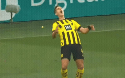 Soccer Player Celebrating Goal In Yellow And Black Striped Shirt GIF