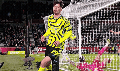 Soccer Player Celebrating Goal In Yellow Jersey GIF