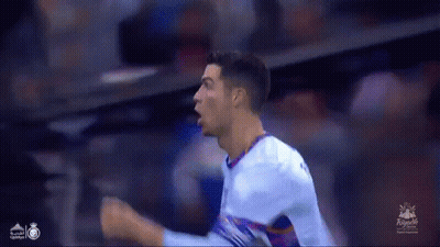 Soccer Player Celebrating Goal With Fist In Air GIF
