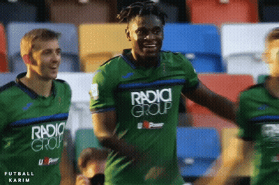 Soccer Player Celebrating In Green Jersey GIF