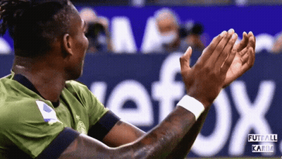 Soccer Player Clapping In Front Of Futball Karim Banner GIF