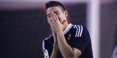 Soccer Player Covering Face And Laughing GIF