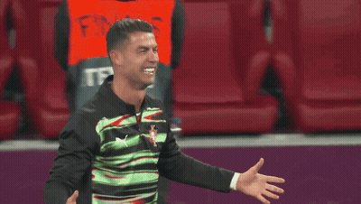 Soccer Player Covering Face Man In Suit Holding Shoulder GIF