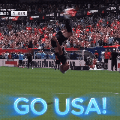 Soccer Player Doing Handstand On Field With Go USA GIF