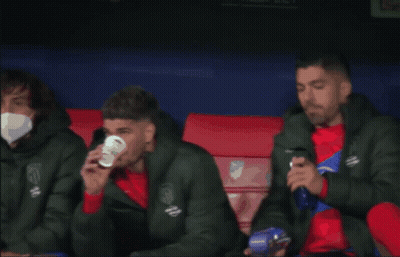 Soccer Player Drinking Cup On Bench GIF