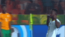 Soccer Player Ear Plugs Using His Fingers GIF