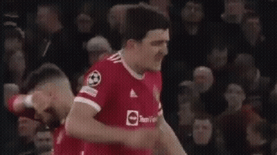 Soccer Player Giving Fist Bump In Front Of Crowd GIF