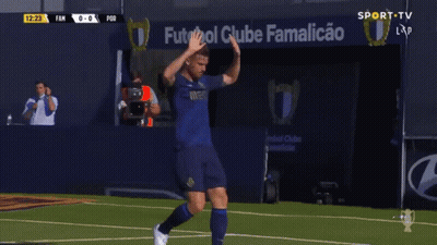 Soccer Player High Fiving By Ventilation Sign GIF