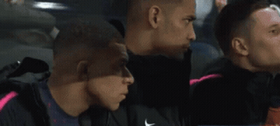 Soccer Player Holding Ball In Front Of Face GIF