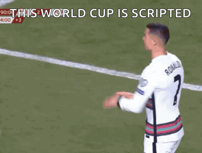 Soccer Player Holding Blue Card Saying This World Cup Is Scripted GIF