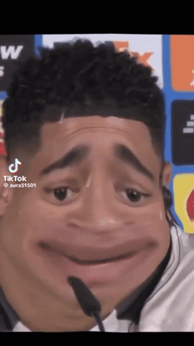 Soccer Player Holding Chair Over Head In Emirates Fly Better Shirt GIF