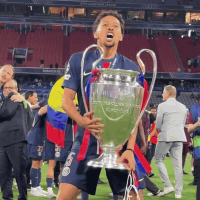 Soccer Player Holding Champions League Trophy GIF