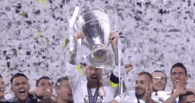Soccer Player Holding Trophy In Front Of Crowd GIF