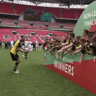 Soccer Player Holding Trophy GIF