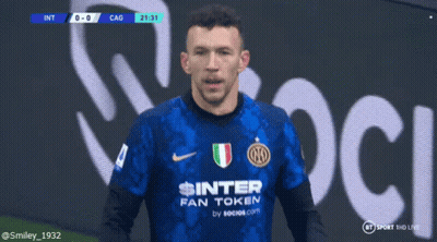 Soccer Player Holding Trophy With IO On Shirt GIF