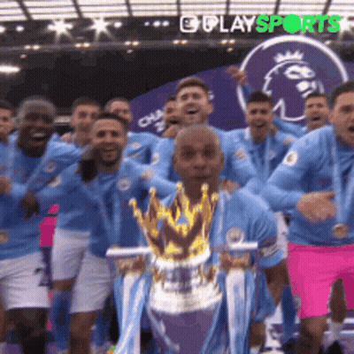 Soccer Player Holding Trophy GIF