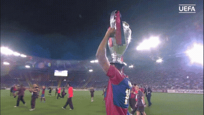 Soccer Player Holding UEFA Trophy GIF