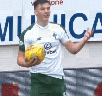 Soccer Player Holding Yellow Ball GIF