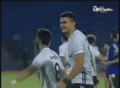 Soccer Player Hugging Another Player GIF