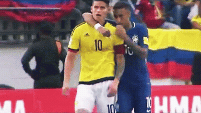 Soccer Player In Adidas Jersey Next To Another GIF