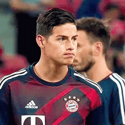 Soccer Player In Adidas Jersey Next To Another Soccer Player GIF