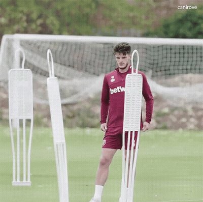 Soccer Player In Betw Jersey Next To Mannequin GIF