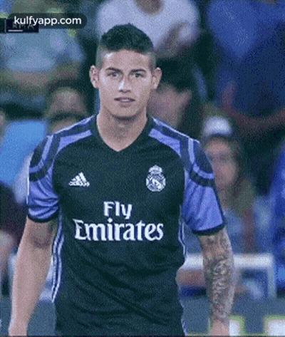 Soccer Player In Black And Purple Fly Emirates Jersey GIF