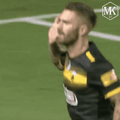 Soccer Player In Black And Yellow Jersey GIF