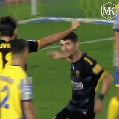 Soccer Player In Black And Yellow Jersey Number 8 GIF